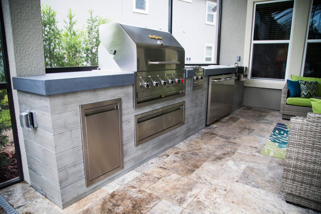 16' Modern Outdoor Kitchen, natural Gray concrete with a Graphite colored 4" thick top. Crown Verity grill and appliances.