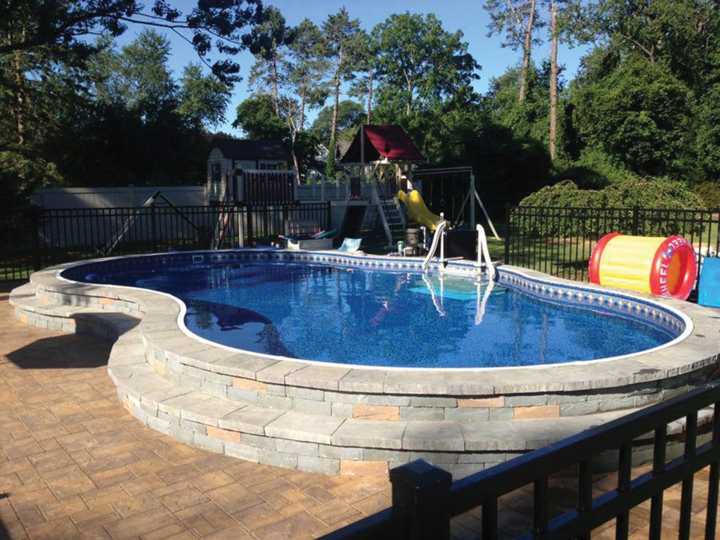 18'x32' Radiant semi inground pool with pavers