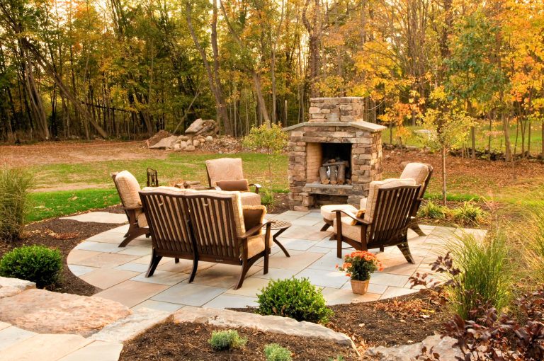 Example of a classic patio design in Boston with a fire pit