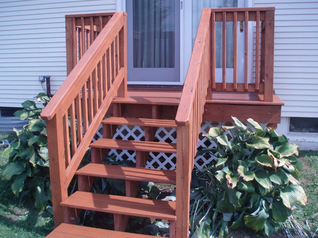 5 x 8 pressure treated deck with 3 coats of the Cabot brand Stain