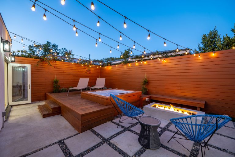 Trendy concrete patio photo in Los Angeles with a fire pit and no cover