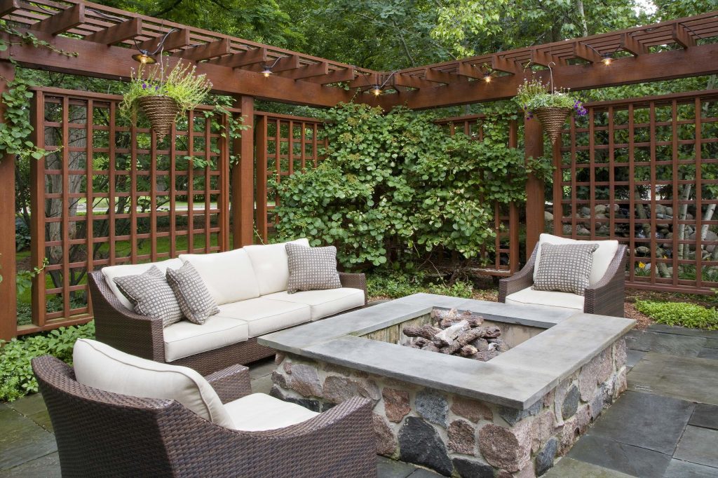 An elegant wooden screen supplies just enough enclosure around this wonderful outdoor seating area featuring a custom built in gas fire pit. Like us on Houzz and see more of our work at www.rollinglandscapes.com.

Photo by: Linda Oyama Bryan by Rolling Landscapes Inc. | Fire Pits|Backyard Design|Outdoor Living Spaces|Landscape Design|Backyard Ideas|Landscaping|Landscaping Ideas|Landscape Installation|Fire Feautures|Fire Pit