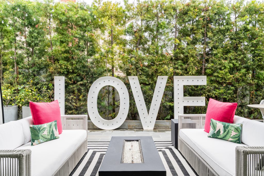 LOVE this patio with LED signs for a special family