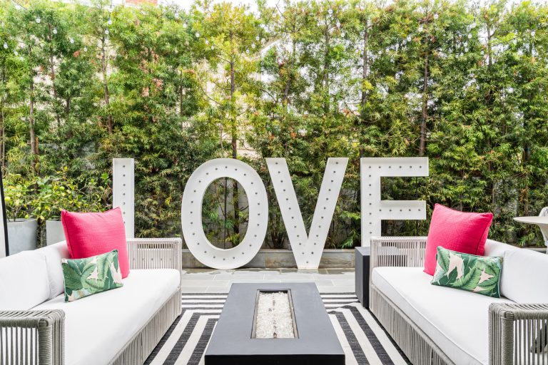 LOVE this patio with LED signs for a special family