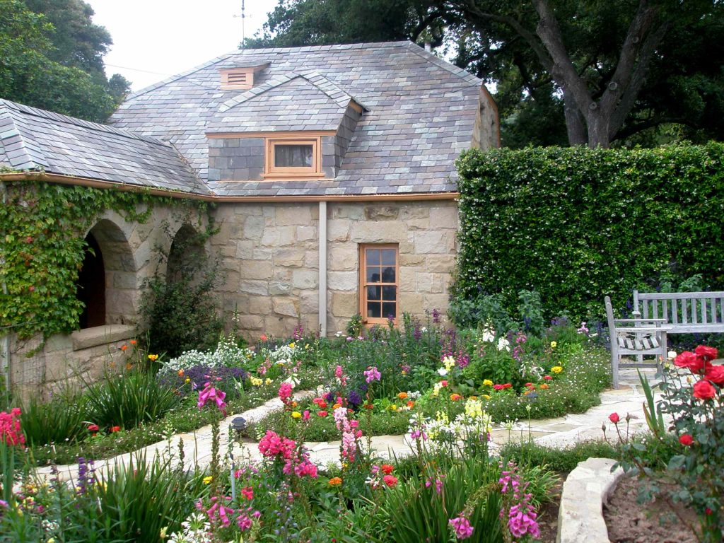 A beautiful cottage garden, profuse with vibrant blooms.