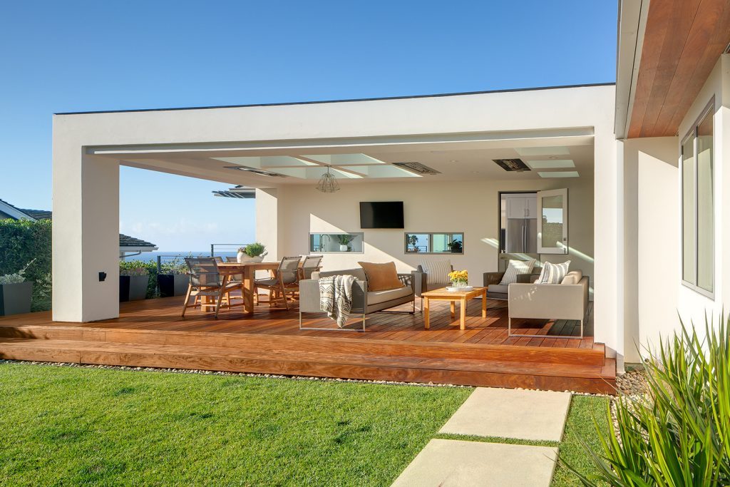 A covered space was added to the yard, creating an additional living and dining room.