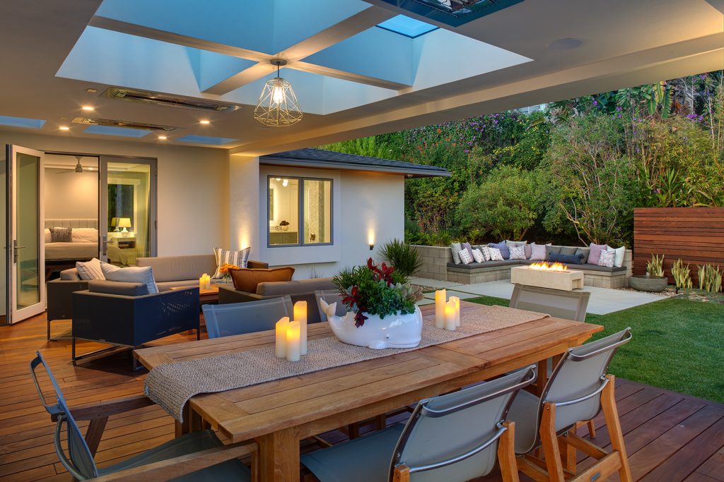 A covered space was added to the yard, creating an additional living and dining room.
