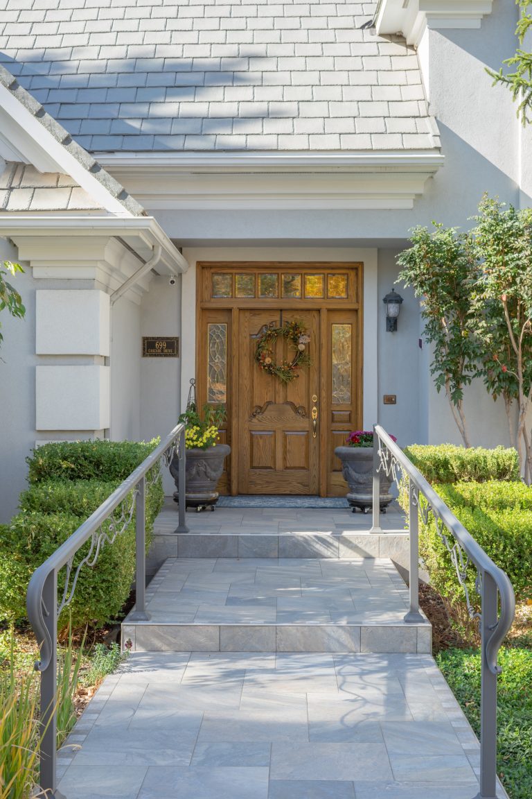 A heated tile entry walk and custom handrail welcome you into this beautiful home.