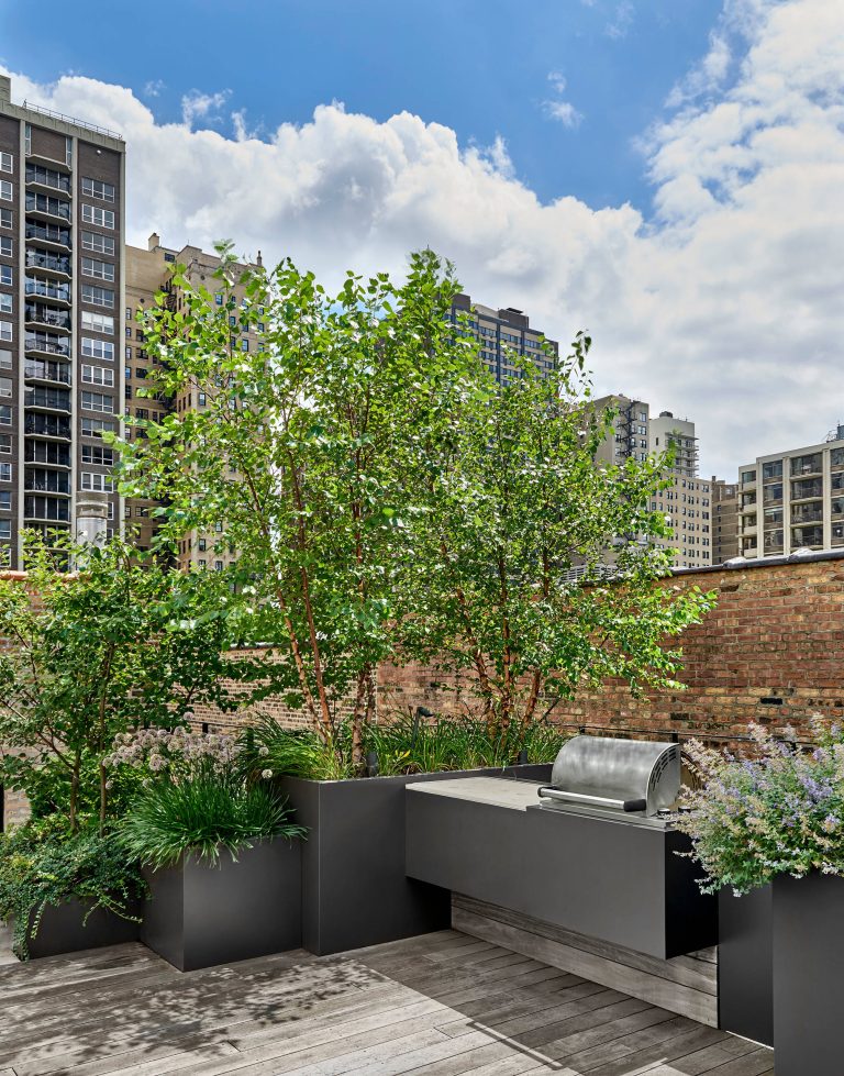A matching custom casing houses a built-in BBQ grill