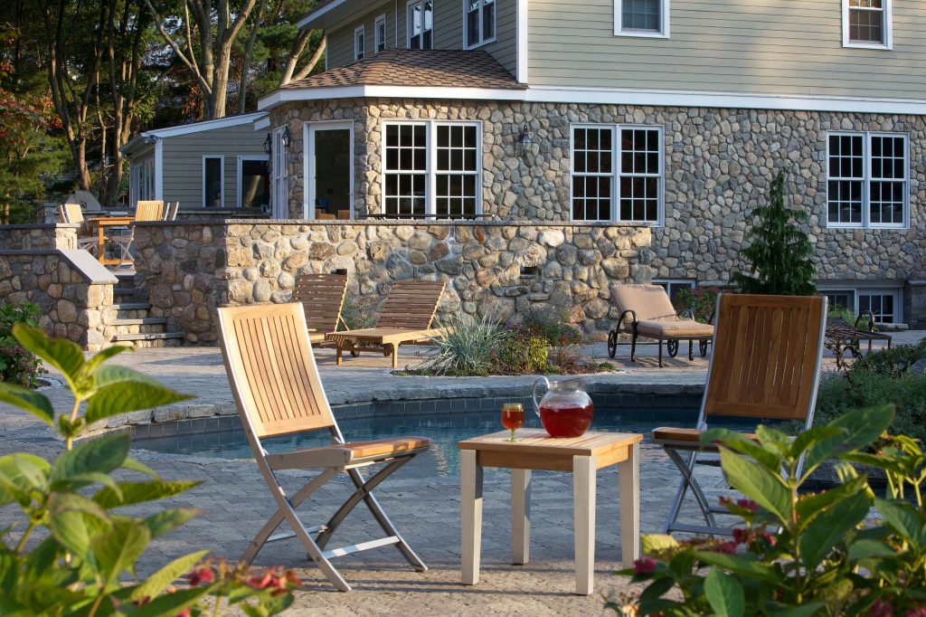 A natural backyard and patio. Small rounds.