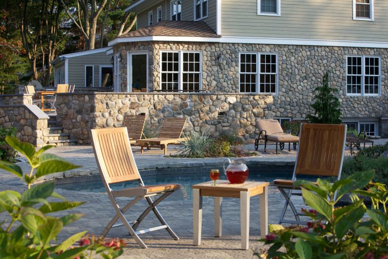 A natural backyard and patio. Small rounds.