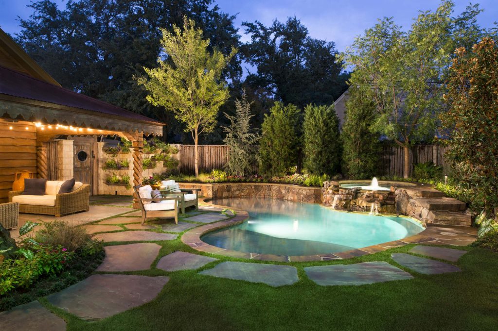 A natural pool setting creates a oasis in the midst of a busy neighborhood.