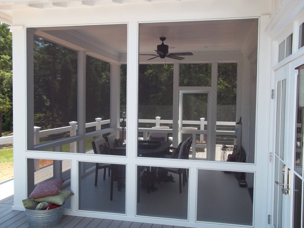 A nice screened porch on a Eric Moser design. We utilized screen-eze for a clean look and easy maintenance.