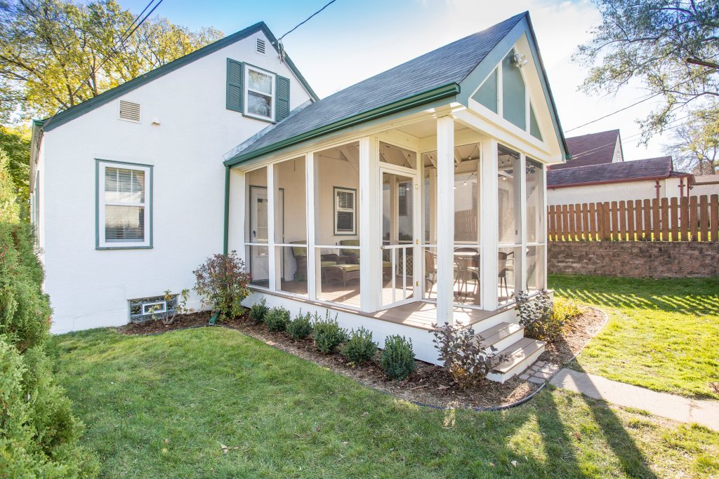 A one-and-a-half story home in Minneapolis' Hale neighborhood got a whole lot bigger when we helped these clients add on a screened-in porch. Photo by David J. Turner by Metamorphosis Design-Build | Outdoor Photos | Porch | Landscaping | Landscape Design | Outdoor Living Space | Porch Design Ideas | Outdoor Living Space Ideas | Backyard Design