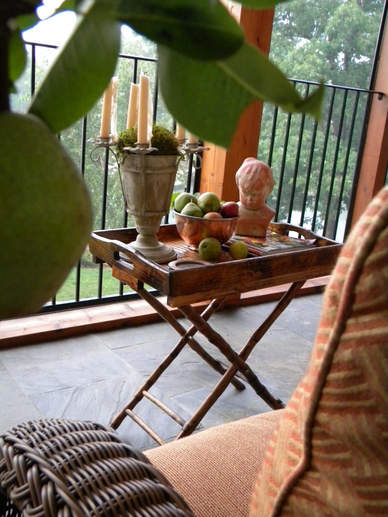 A porch vignette welcomes a view!
