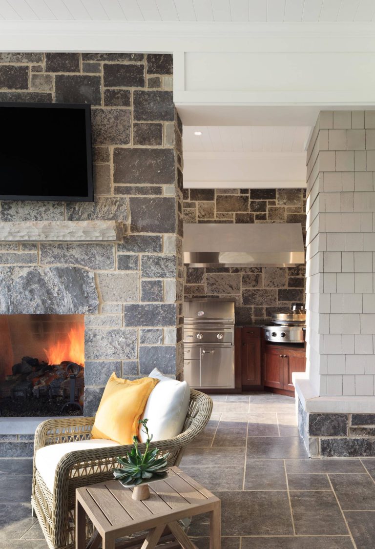 A view of the outdoor porch. You can see the grill station and also outdoor fireplace.