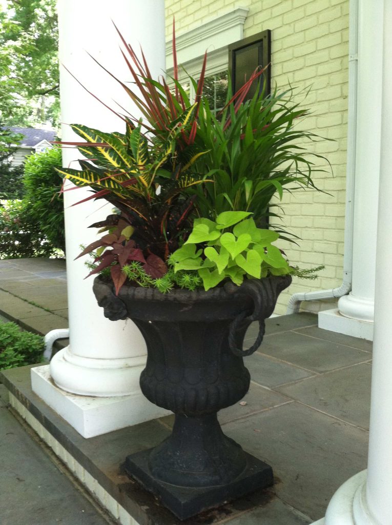 Add some color to your porch or entry way with Fall planters.
