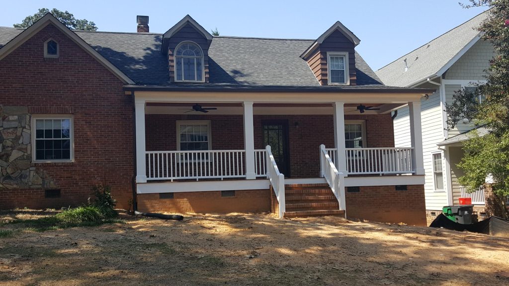 Added a 30’x8’ Covered Font Porch to Plaza Midwood home.