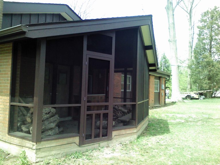 After - exterior home renovation, porch rehab, replace roof, fascia, siding, gutters, downspouts