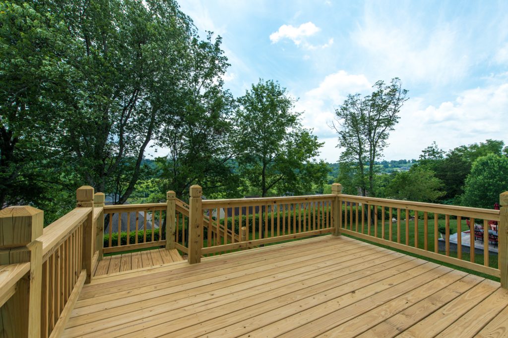 Arts and crafts back porch photo in Other by HMH Development, Inc. | Outdoor Photos | Porch | Landscaping | Landscape Design | Outdoor Living Space | Porch Design Ideas | Outdoor Living Space Ideas | Backyard Design