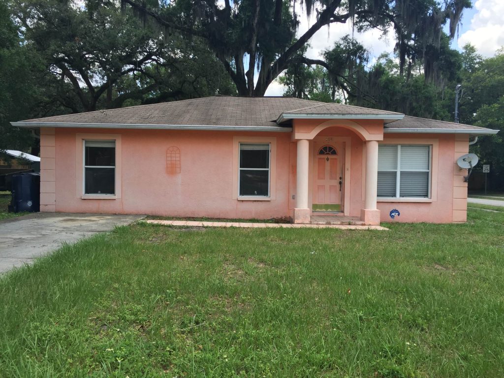 Arts and crafts front porch photo in Tampa with a roof extension by Belt Engineering | Outdoor Photos | Porch | Landscaping | Landscape Design | Outdoor Living Space | Porch Design Ideas | Outdoor Living Space Ideas | Backyard Design