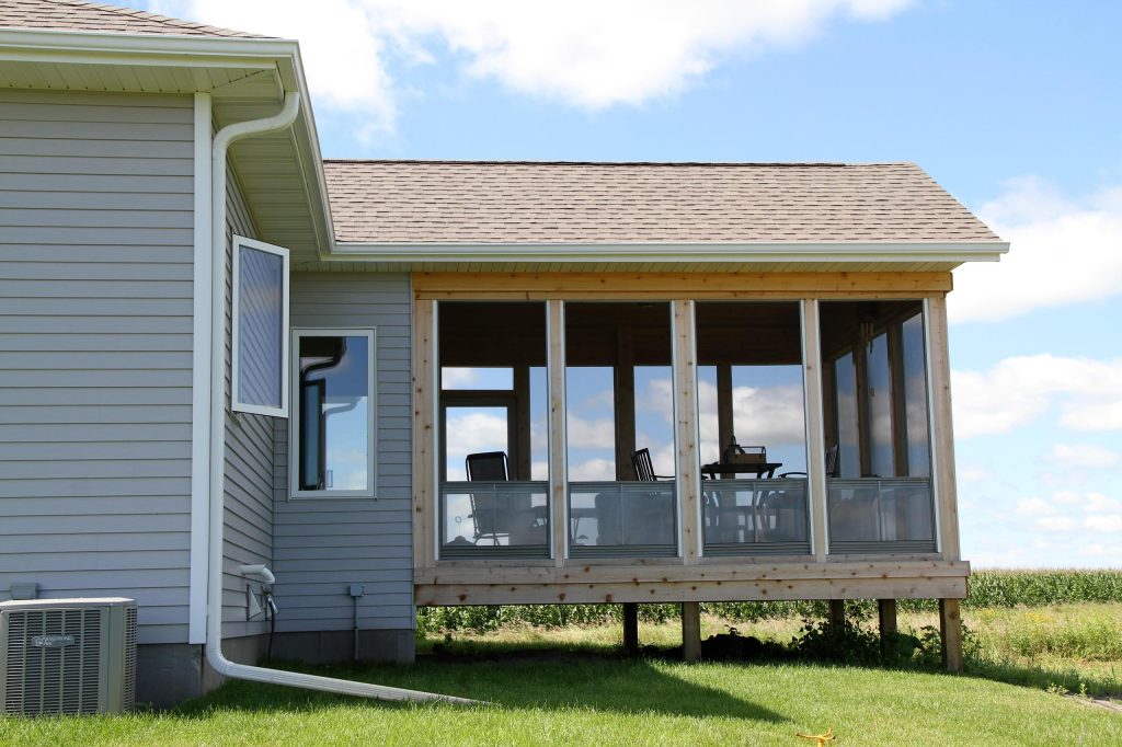 Arts and crafts porch photo in Minneapolis by Mohs Homes, Inc. | Outdoor Photos | Porch | Landscaping | Landscape Design | Outdoor Living Space | Porch Design Ideas | Outdoor Living Space Ideas | Backyard Design