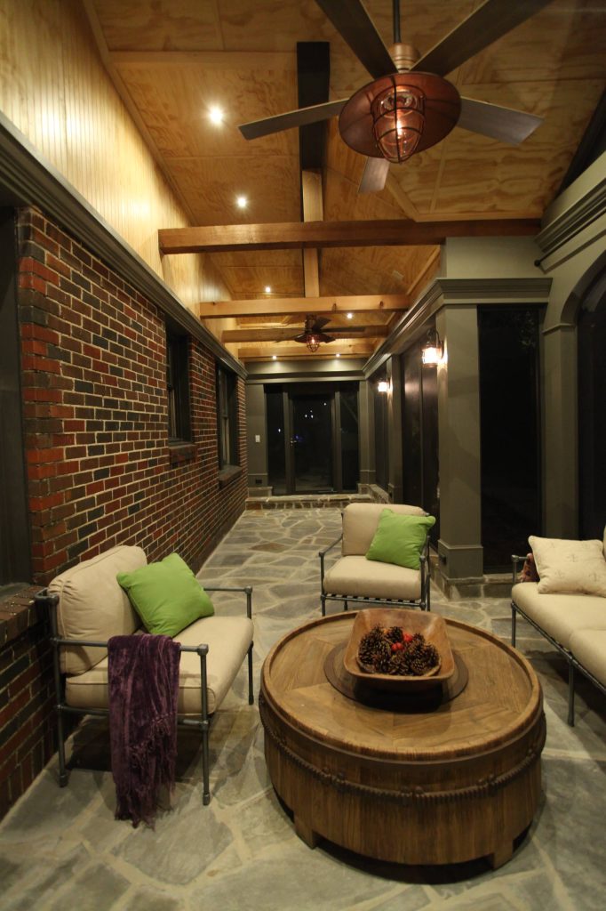 Arts and crafts stone screened-in porch photo in Atlanta with a roof extension by VV Contracting, Inc. | Outdoor Photos | Porch | Landscaping | Landscape Design | Outdoor Living Space | Porch Design Ideas | Outdoor Living Space Ideas | Backyard Design