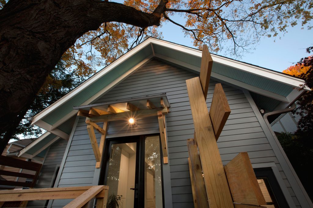 Back porch continues Craftsman theme but with a slightly more modern twist - Architecture/Interior Design/Renderings/Photography: HAUS | Architecture - Construction Management: WERK | Building Modern by WERK | Building Modern | Outdoor Photos | Porch | Landscaping | Landscape Design | Outdoor Living Space | Porch Design Ideas | Outdoor Living Space Ideas | Backyard Design