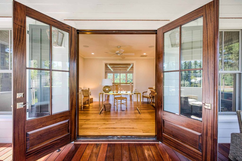 Back porch photo in Other with a roof extension by CS Thomas Construction | Outdoor Photos | Porch | Landscaping | Landscape Design | Outdoor Living Space | Porch Design Ideas | Outdoor Living Space Ideas | Backyard Design