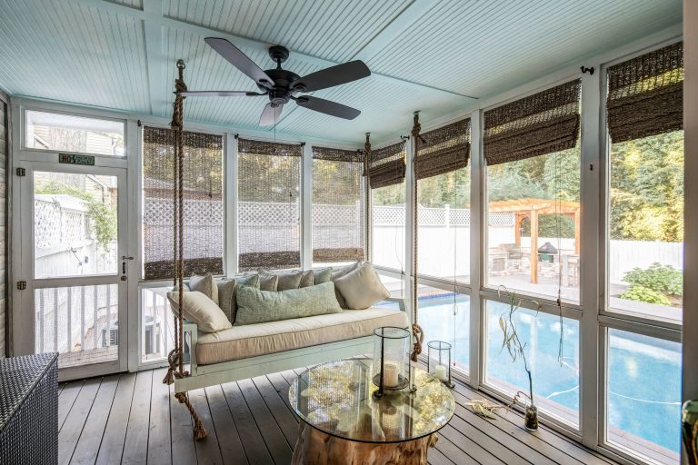 Back porch renovation with custom made bed porch swing