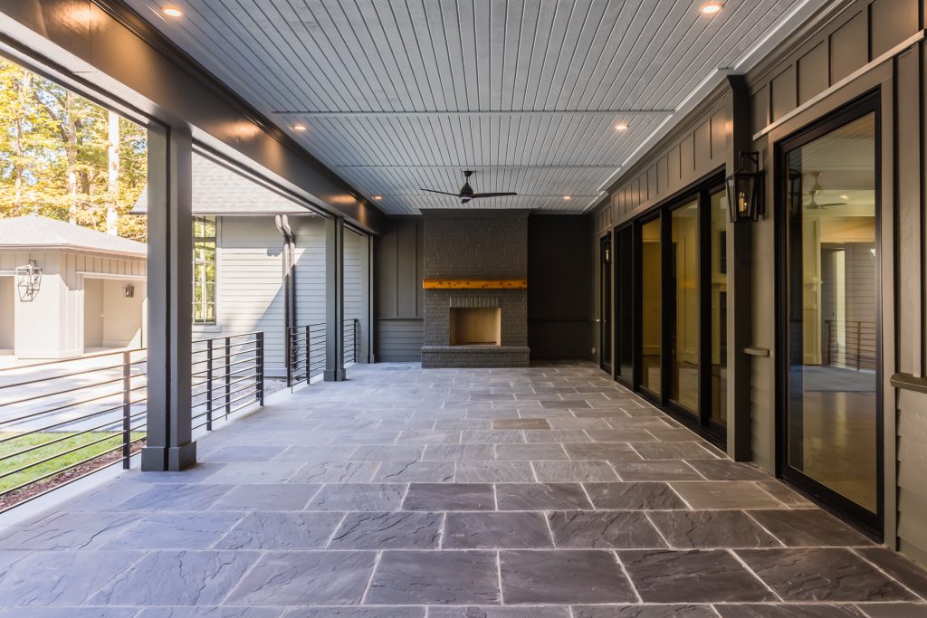 Back porch with fireplace and phantom screens