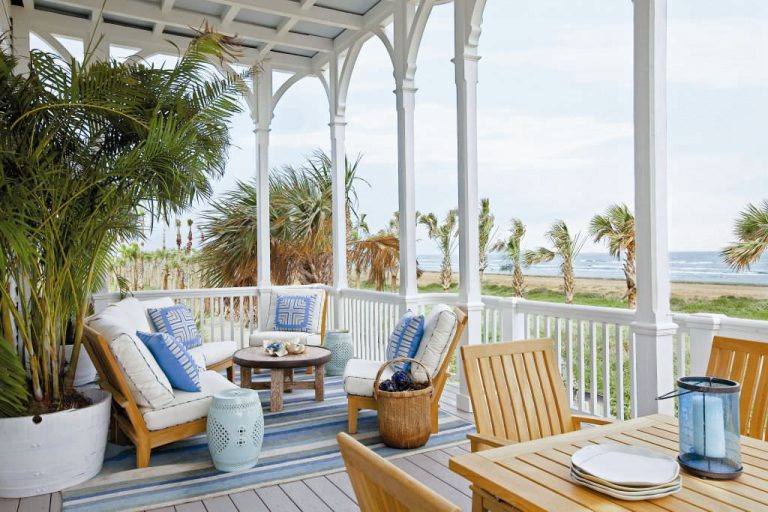 Beach style back porch idea in Austin with decking and a roof extension by Michael G Imber, Architects | Outdoor Photos | Porch | Landscaping | Landscape Design | Outdoor Living Space | Porch Design Ideas | Outdoor Living Space Ideas | Backyard Design