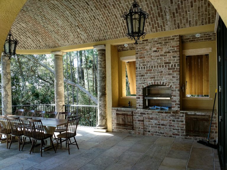 Beach style concrete paver porch idea in Charleston with a roof extension by Gilchrist Masonry & Pools | Outdoor Photos | Porch | Landscaping | Landscape Design | Outdoor Living Space | Porch Design Ideas | Outdoor Living Space Ideas | Backyard Design