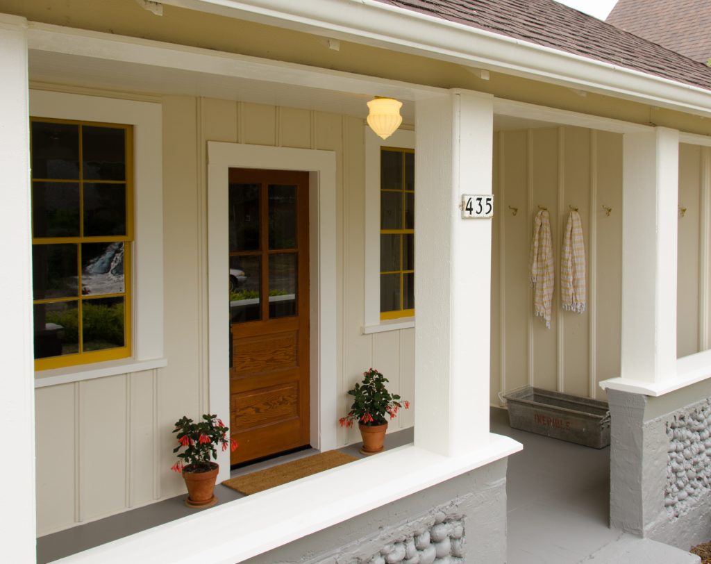 Beach style front porch photo in Portland with a roof extension by Emerick Architects | Outdoor Photos | Porch | Landscaping | Landscape Design | Outdoor Living Space | Porch Design Ideas | Outdoor Living Space Ideas | Backyard Design