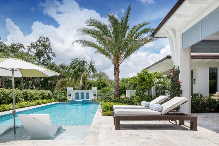 Beach style pool photo in Miami