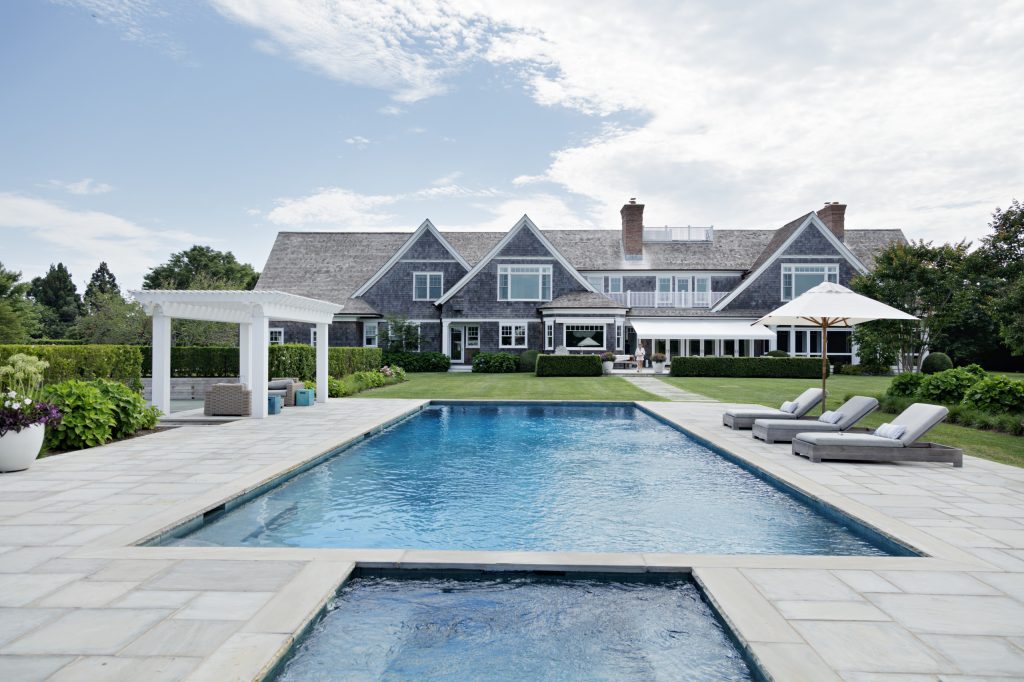 Beach style pool photo in New York