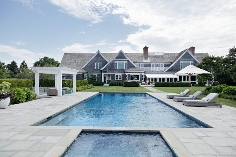 Beach style pool photo in New York