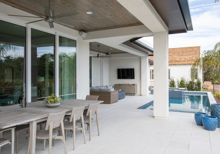 Beach style porch idea in Jacksonville by Neena Corbin Kitchens | Outdoor Photos | Porch | Landscaping | Landscape Design | Outdoor Living Space | Porch Design Ideas | Outdoor Living Space Ideas | Backyard Design