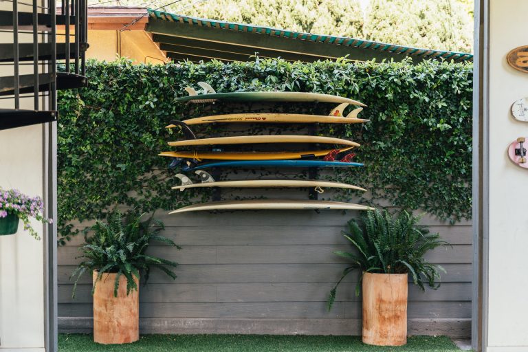 Beach style porch idea in Other by Kim Gordon Designs | Outdoor Photos | Porch | Landscaping | Landscape Design | Outdoor Living Space | Porch Design Ideas | Outdoor Living Space Ideas | Backyard Design