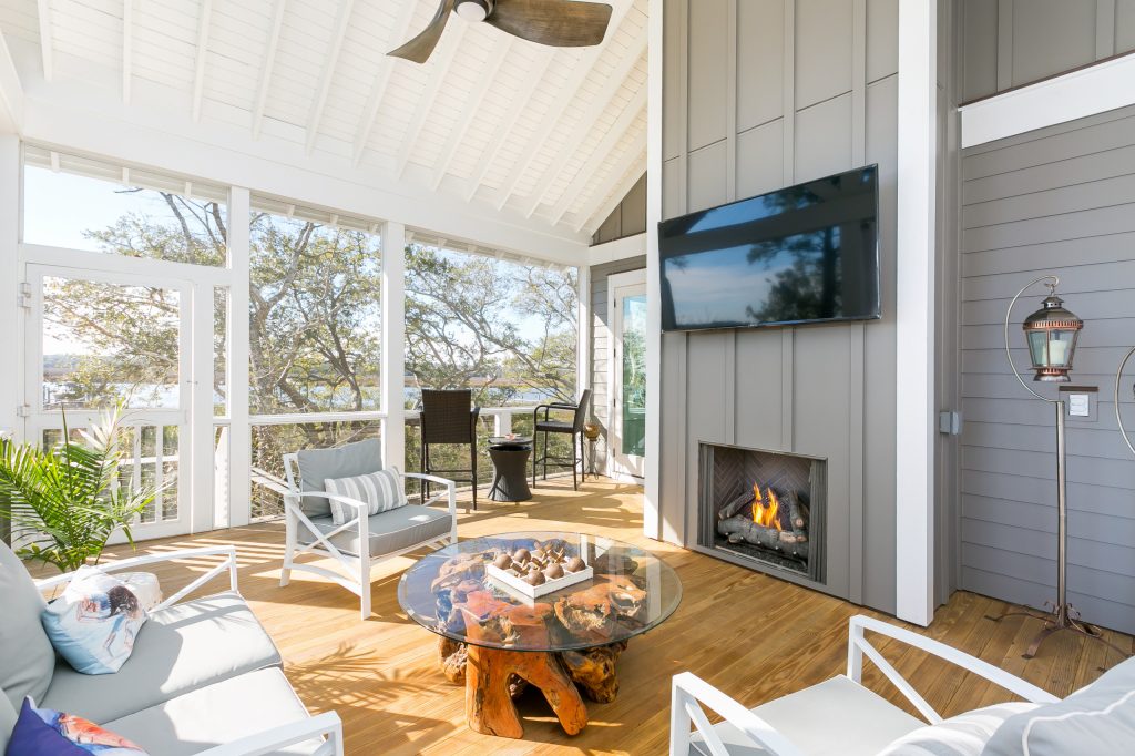 Beach style porch photo in Charleston by Tyler Custom Homes LLC | Outdoor Photos | Porch | Landscaping | Landscape Design | Outdoor Living Space | Porch Design Ideas | Outdoor Living Space Ideas | Backyard Design