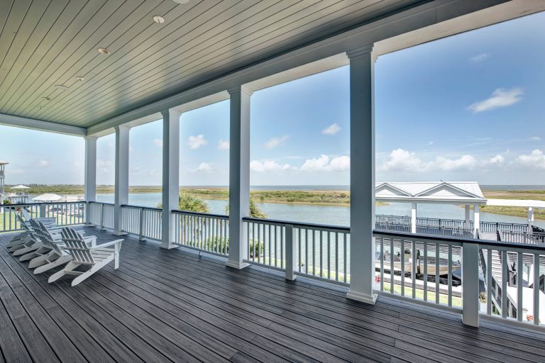 Beach style porch photo in Houston by L. Pearson Design | Outdoor Photos | Porch | Landscaping | Landscape Design | Outdoor Living Space | Porch Design Ideas | Outdoor Living Space Ideas | Backyard Design