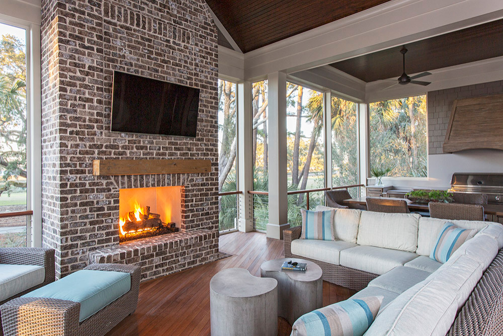 Beach style screened-in porch idea in Charleston with decking and a roof extension by Margaret Donaldson Interiors | Outdoor Photos | Porch | Landscaping | Landscape Design | Outdoor Living Space | Porch Design Ideas | Outdoor Living Space Ideas | Backyard Design