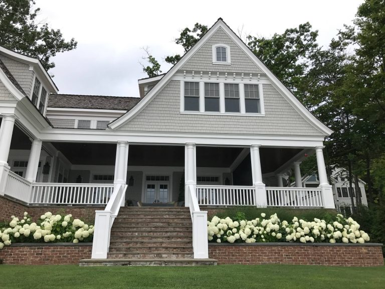 Beach style screened-in porch photo in Other by PHANTOM RETRACTABLE SCREENS | Outdoor Photos | Porch | Landscaping | Landscape Design | Outdoor Living Space | Porch Design Ideas | Outdoor Living Space Ideas | Backyard Design