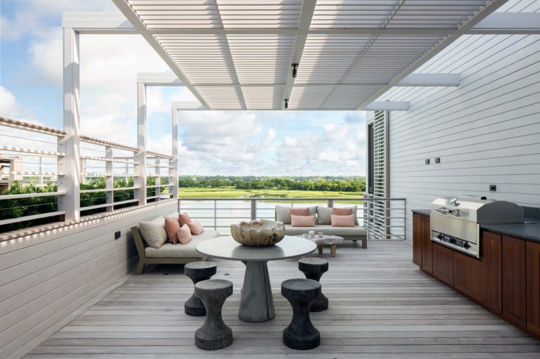 Beach style second story mixed material railing deck photo in New York