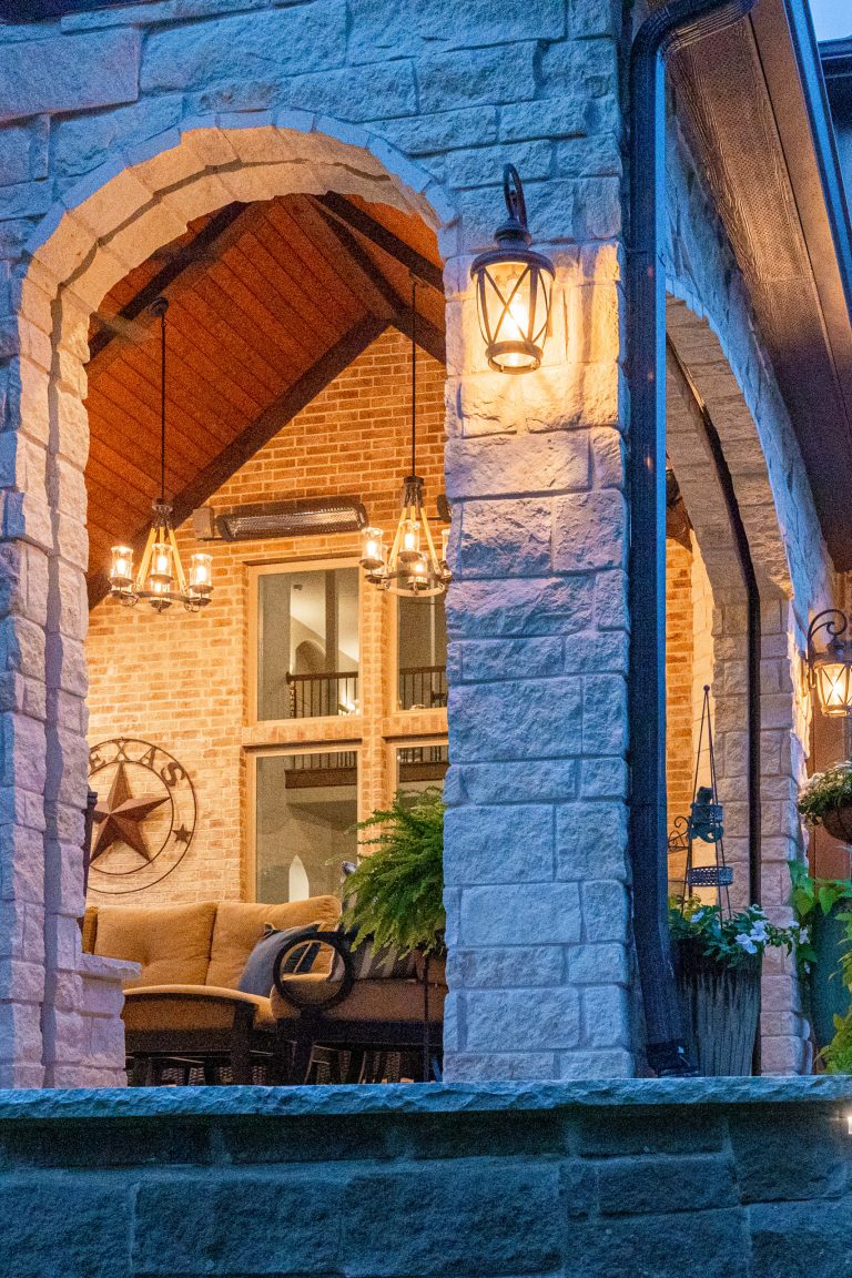 Beautiful lighting throughout the entire project!

Electric heaters were installed on the wall opposite the fireplace to create a warm and cozy space on chilly nights.

Photography credit: Snap Point Media by TCP Custom Outdoor Living | Outdoor Kitchens | Backyard Design | Outdoor Living Spaces | Landscape Design