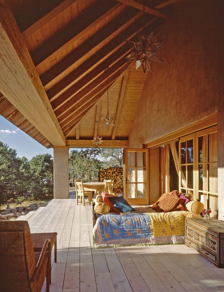 Bed can be rolled outside to front porch for al fresco sleeping.