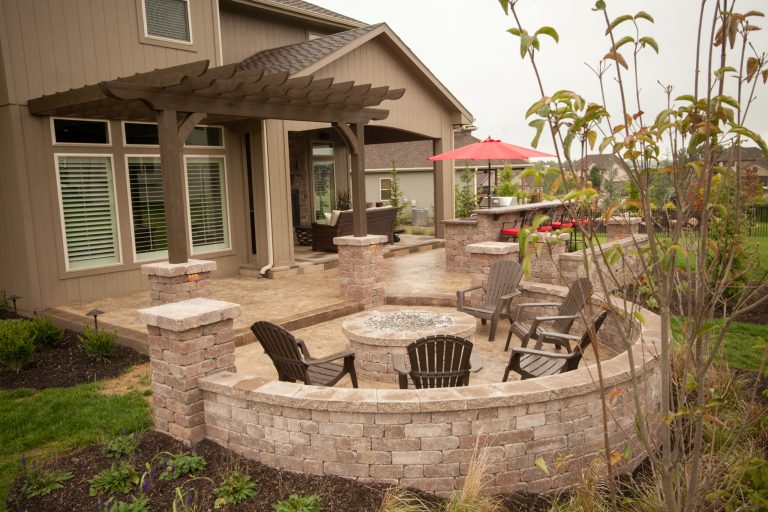 Belgard Weston Wall & Firepit, Stamped Concrete, Outdoor Kitchen, Stone Veneer Fireplace, Outdoor Room.