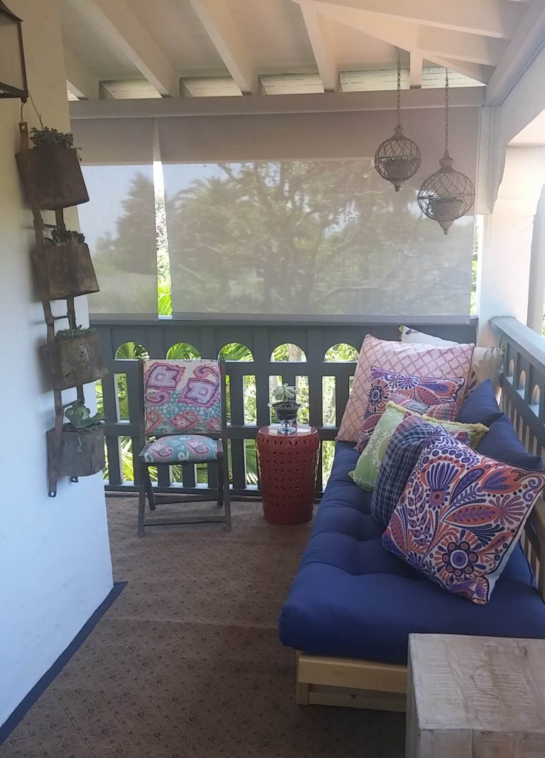 Boho-chic decor for balcony with assorted colorful pillows on futon provides the ideal spot to relax, read a good book or simply hang out with friends! by Casafina Interior Design | Outdoor Photos | Porch | Landscaping | Landscape Design | Outdoor Living Space | Porch Design Ideas | Outdoor Living Space Ideas | Backyard Design