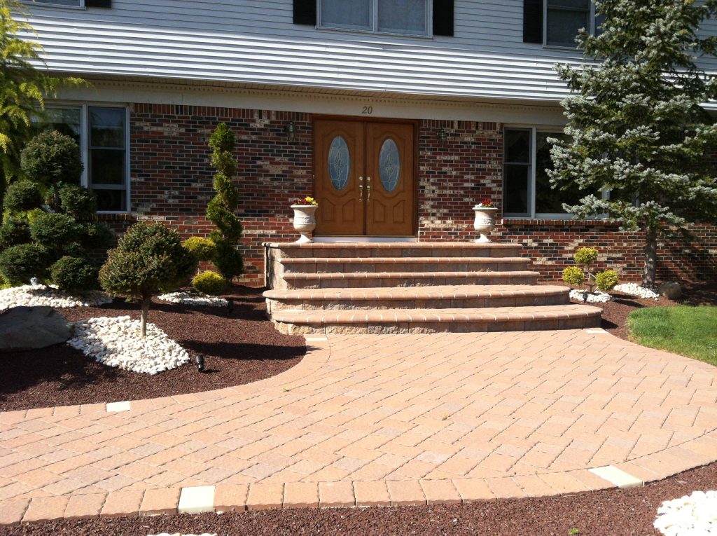 Brick front porch photo in New York by Paradise Stone & Tile | Outdoor Photos | Porch | Landscaping | Landscape Design | Outdoor Living Space | Porch Design Ideas | Outdoor Living Space Ideas | Backyard Design