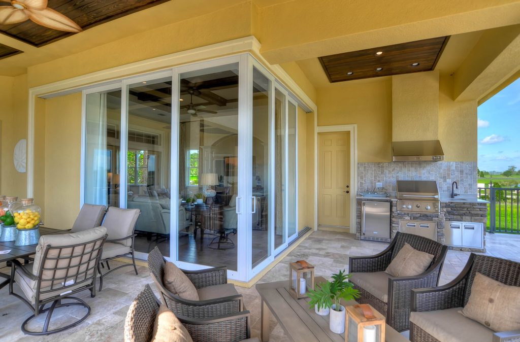 Bring the outdoors in by opening the disappearing sliding glass doors